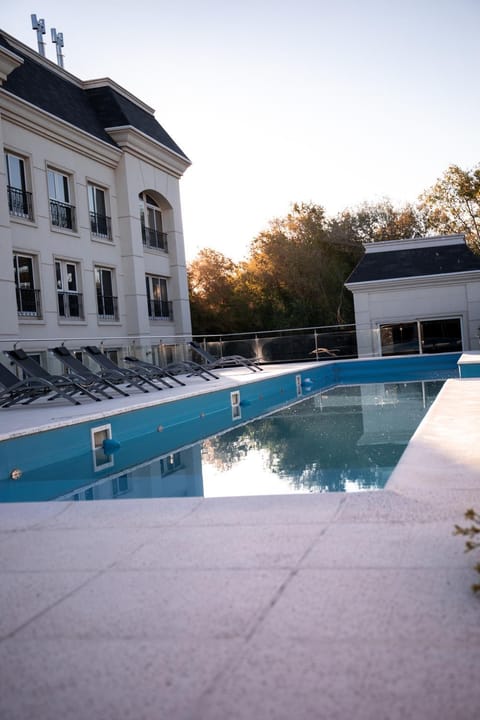 Property building, Swimming pool, Sunset