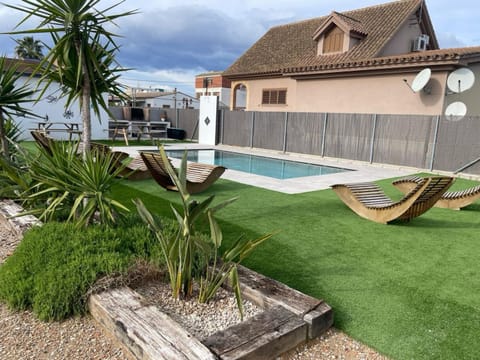 Property building, Living room, Swimming pool