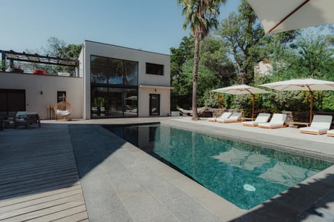 Property building, Living room, Swimming pool