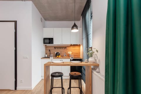 Kitchen or kitchenette, microwave, oven, stove, kitchen