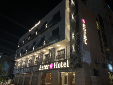 Property building, Night, Text overlay