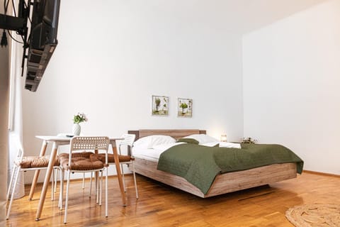 Bed, Seating area, Dining area, Bedroom