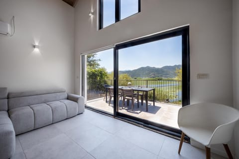 Natural landscape, View (from property/room), Living room, Seating area