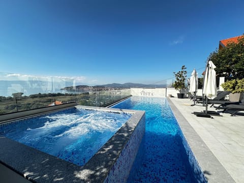 Swimming pool, sunbed