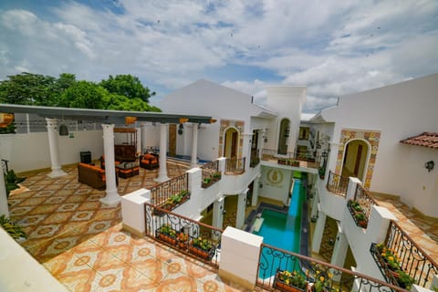 Property building, Patio, Day, View (from property/room), Balcony/Terrace, Pool view, Swimming pool