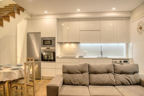 Kitchen or kitchenette, Living room, Seating area, Dining area