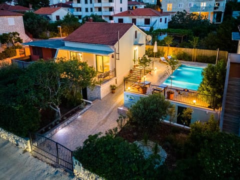Property building, Patio, Night, Pool view, Swimming pool, Parking, sunbed