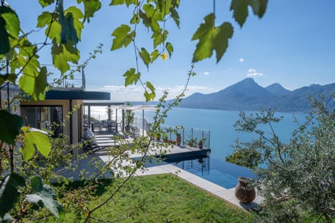 Property building, Garden, View (from property/room), Lake view, Swimming pool