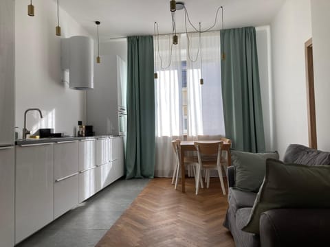 Kitchen or kitchenette, Living room, Seating area, Dining area, stove