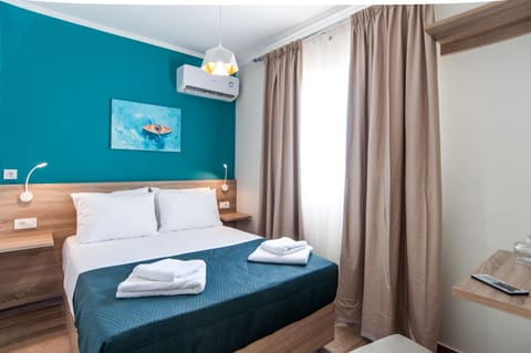 Bed, Photo of the whole room, Bedroom, towels, air conditioner