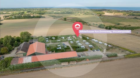 Welcome in - Wikkelhouse met grote tuin en 2 terrassen, Kon Emmaweg 6 Vrouwenpolder Apartment in Vrouwenpolder