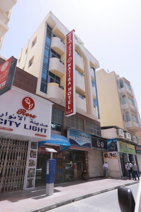 Property building, Day, Property logo or sign, Logo/Certificate/Sign, City view, Street view, Location