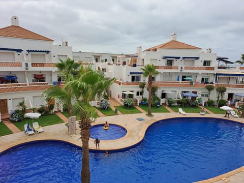 Property building, Patio, Day, Pool view, Swimming pool, sunbed