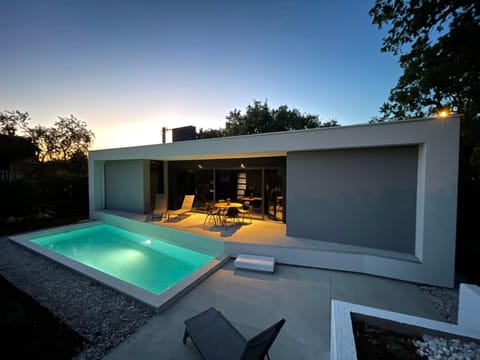 Property building, Swimming pool, Sunset