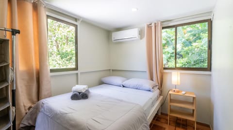 Bed, Bedroom, Garden view, towels, wardrobe, air conditioner
