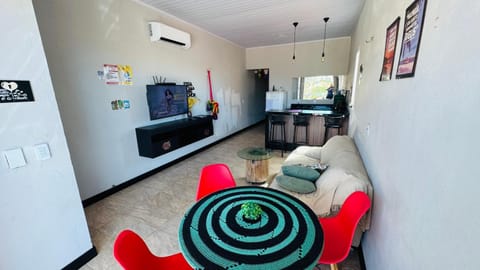 Communal lounge/ TV room, Living room, Seating area, air conditioner