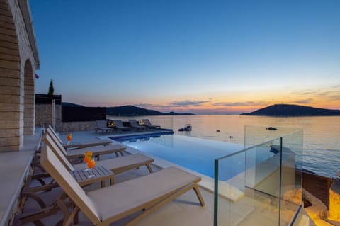 Patio, View (from property/room), Pool view, Sea view, Swimming pool, Sunrise, Sunset, sunbed