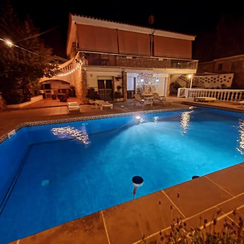 Property building, Night, Pool view, Swimming pool, sunbed