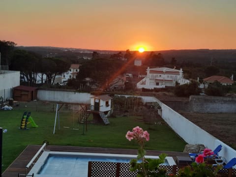 Property building, Natural landscape, Bird's eye view, Swimming pool, Sunset