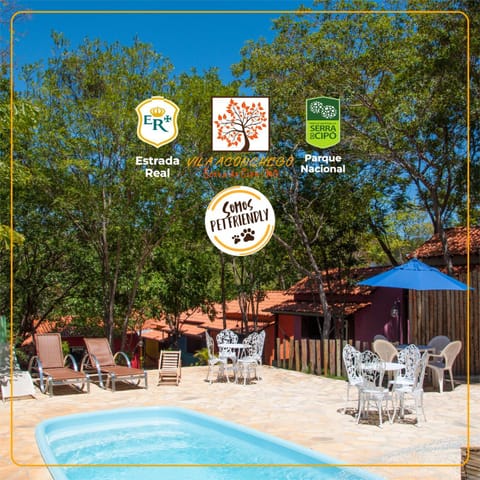 Property building, Day, Property logo or sign, Pool view, Swimming pool, sunbed