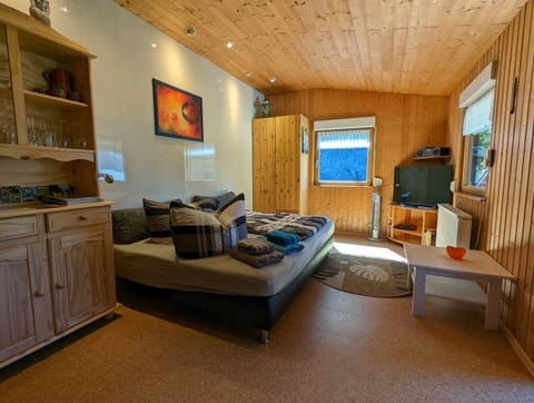 Bed, Living room, Seating area