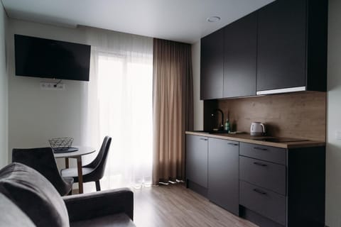 Communal lounge/ TV room, Kitchen or kitchenette, Living room, Seating area