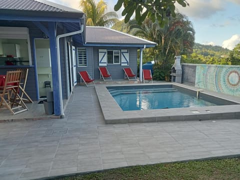 Property building, Natural landscape, Pool view, Swimming pool, sunbed