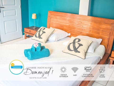 Bed, Property logo or sign, Photo of the whole room, Bedroom, Text overlay, towels