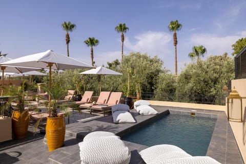 Patio, Day, Garden, Balcony/Terrace, Pool view, Swimming pool, sunbed