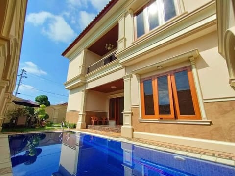 Property building, Patio, Day, Pool view, Swimming pool