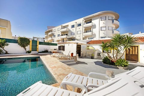 Property building, Living room, Swimming pool