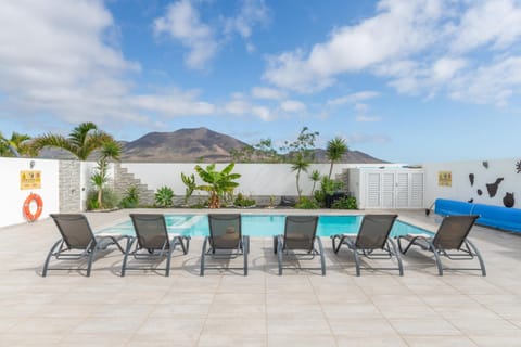 Property building, Living room, Swimming pool