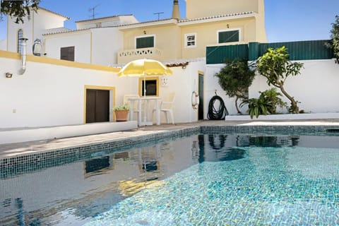 Property building, Living room, Swimming pool