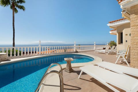 Property building, Living room, Swimming pool