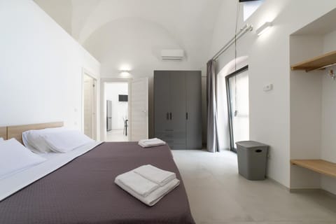 Bed, Photo of the whole room, Bedroom, towels, wardrobe, air conditioner