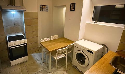 Kitchen or kitchenette, Dining area, oven, washing machine, dryer
