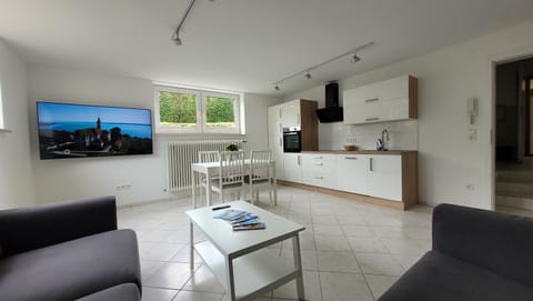 TV and multimedia, Kitchen or kitchenette, Living room, Seating area, Dining area, Garden view