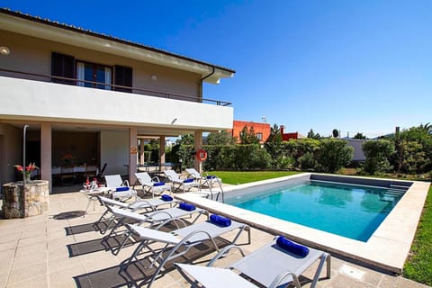 Property building, Living room, Swimming pool