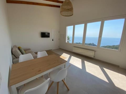 Property building, Living room, Dining area, Sea view
