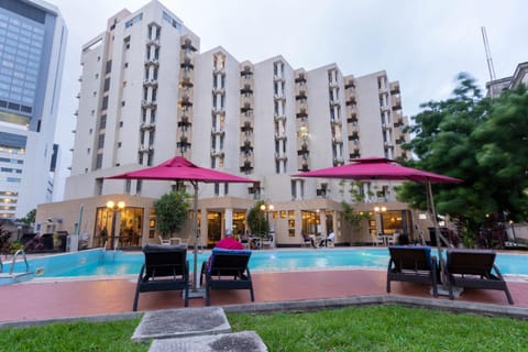 Property building, Patio, Evening entertainment, Pool view, Swimming pool, sunbed