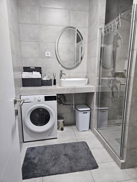 Bathroom, washing machine, dryer