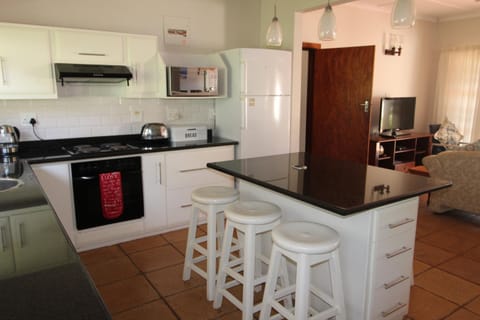 Kitchen or kitchenette, oven, stove, toaster