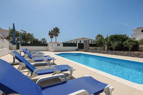 Swimming pool, sunbed