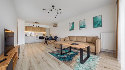 Kitchen or kitchenette, Living room, Seating area, Dining area