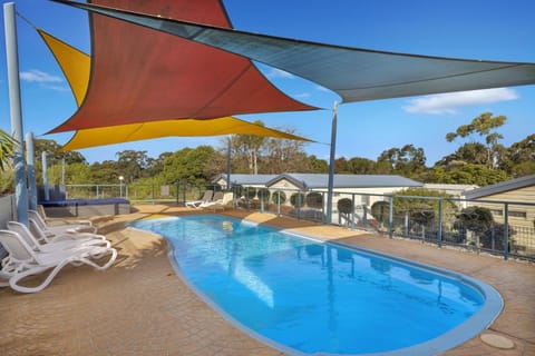 Swimming pool, young children, sunbed