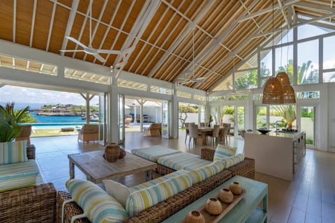 Property building, Living room, Seating area, Dining area, Pool view, Swimming pool