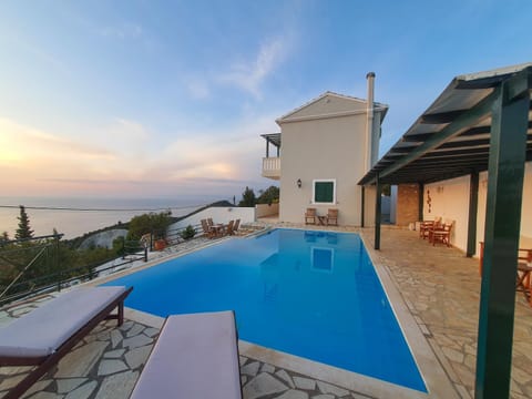 Property building, Natural landscape, Pool view, Sea view
