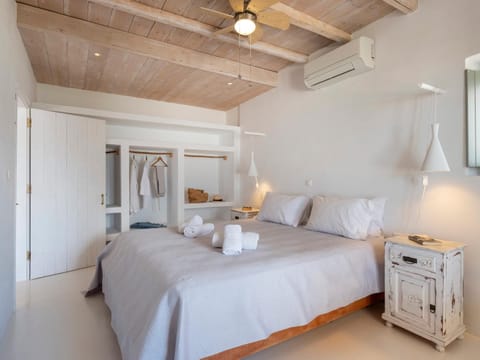 Property building, Bed, Bedroom, towels, wardrobe, air conditioner