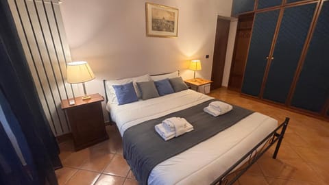 Bed, Photo of the whole room, Bedroom, towels, wardrobe