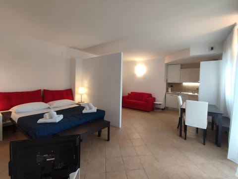 Bed, Living room, Seating area, Bedroom